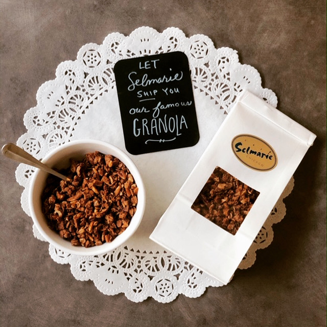 Bowl of granola, package of granola, and note that says "Let Cafe Selmarie ship you our famous granola."