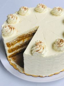 Pumpkin tres leches torte with one slice removed